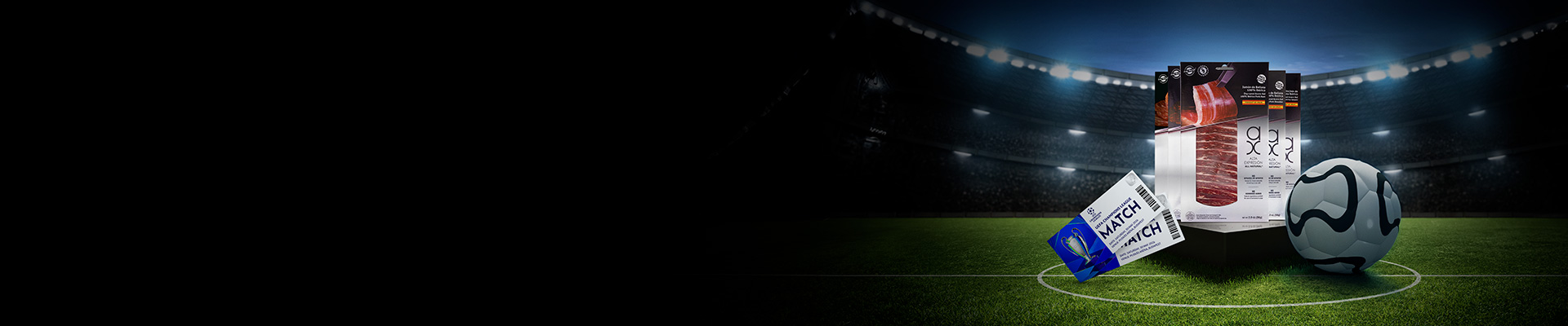 COVAP promotional image for the Football World Cup in the United States. In the foreground, COVAP Iberian ham packages, UEFA Champions League match tickets and a football on the pitch. In the background, a sports stadium with illuminated stands under a dark blue night sky.